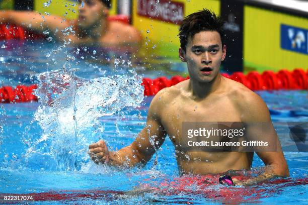Yang Sun of China celebrates after winning the gold medal during the Men's 200m Freestyle final on day twelve of the Budapest 2017 FINA World...