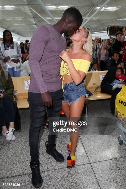 Gabby Allen and Marcel Somerville from Love Island arrive at Stanstead airport on July 25, 2017 in London, England.