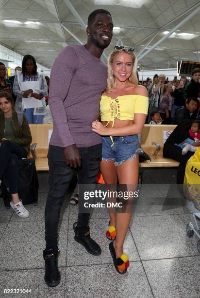 Gabby Allen and Marcel Somerville from Love Island arrive at Stanstead airport on July 25, 2017 in London, England.