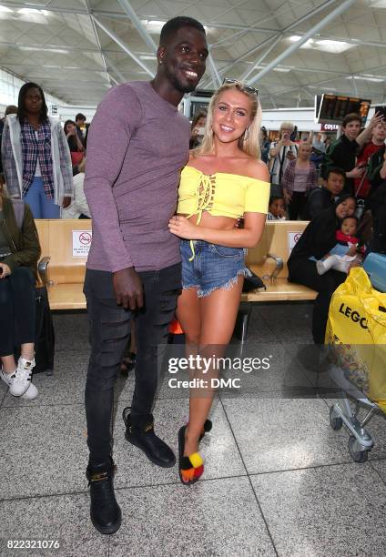 Gabby Allen and Marcel Somerville from Love Island arrive at Stanstead airport on July 25, 2017 in London, England.