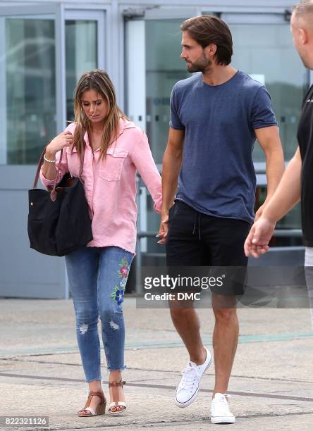 Camilla Thurlow and Jamie Jewitt from Love Island arrive at Stanstead airport on July 25, 2017 in London, England.