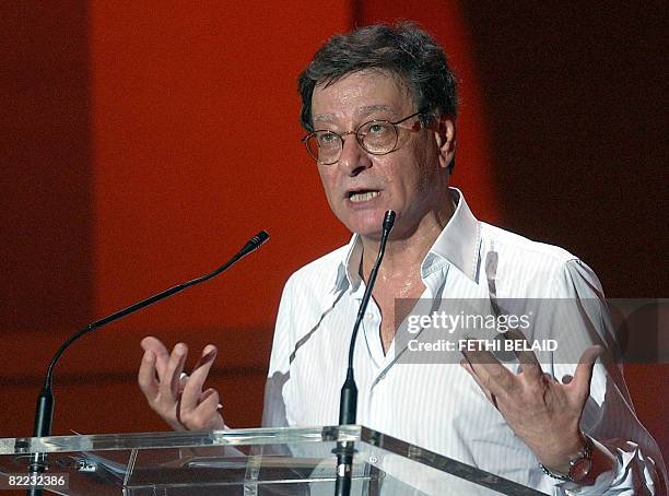 --Palestinian poet Mahmud Darwish performs during the International Carthage festival 11 August 2005 at the Acropolium "ancient cathedral" in...