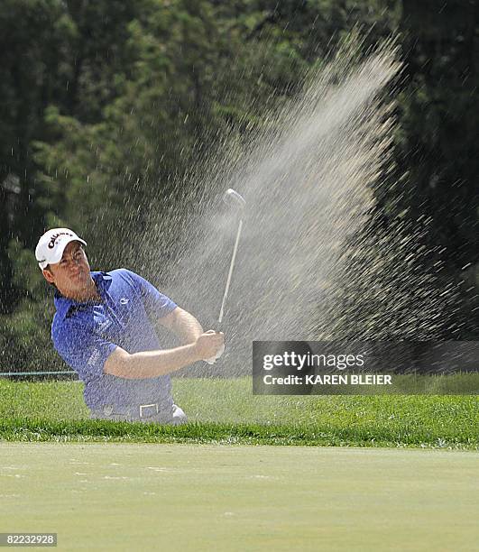 Graeme McDowell of Northern Ireland hits out of a bunker at the ninth hole during third round play at the 90th PGA Championship August 9, 2008 at the...