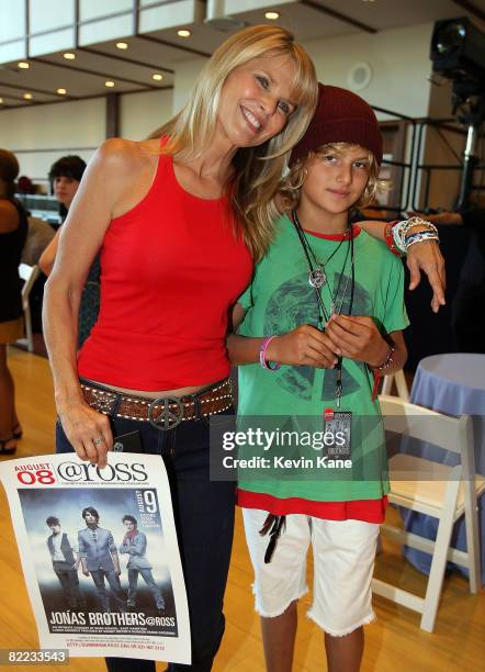 Christie Brinkley poses with son, Jack prior to the Jonas Brothers Rocking Out at Ross School on August 9, 2008 in East Hampton, New York.