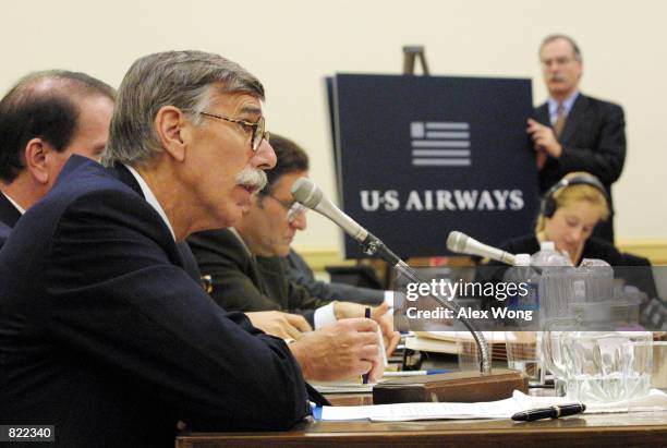 Airways Chairman Stephen M. Wolf testifies March 21, 2001 before the House Energy and Commerce Committee during a hearing on airlines mergers and...