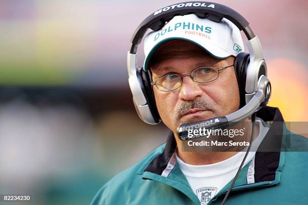 Head Coach Tony Sparano of the Miami Dolphins stands on the sidelines during a pre season game against the Tampa Bay Buccaneers August 9, 2008 at...