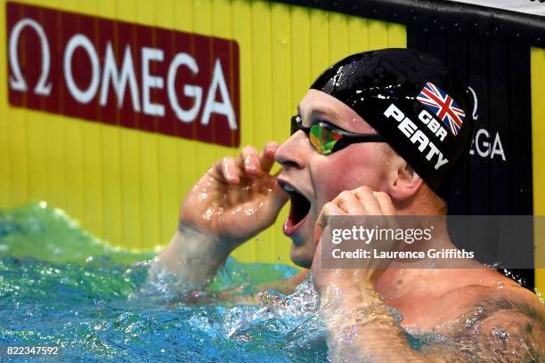 Adam Peaty of Great Britain celebrates victory in a world record time of 25.95 during the Men's 50m Breaststroke final two on day twelve of the...