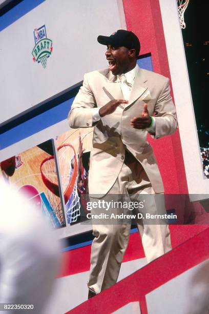 Mateen Cleaves celebrates and walks on stage after he was selected number fourteen overall by the Detroit Pistons during the 2000 NBA Draft on June...