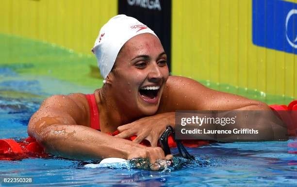 Kylie Jacqueline Masse of Canada celebrates after winning the gold medal in a world record time of 58.10 during the Women's 100m Backstroke final on...