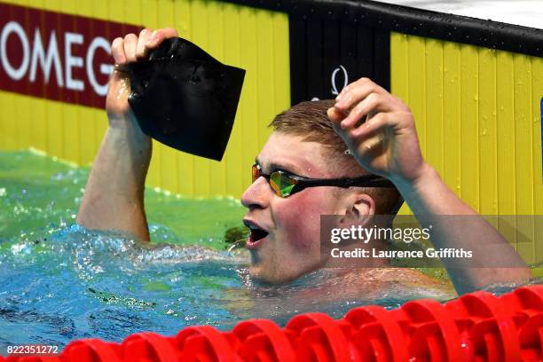 Adam Peaty of Great Britain celebrates victory in a world record time of 25.95 during the Men's 50m Breaststroke final two on day twelve of the...