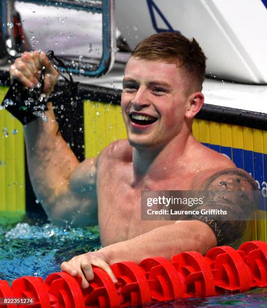 Adam Peaty of Great Britain celebrates victory in a world record time of 25.95 during the Men's 50m Breaststroke final two on day twelve of the...