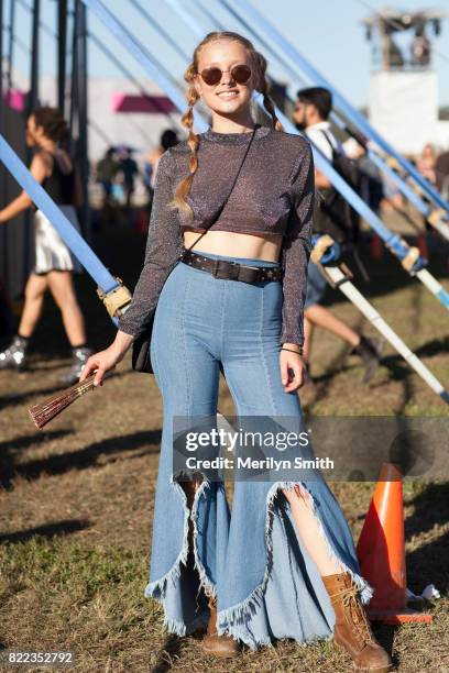 Festivalgoer wearing flared denim jeans during Splendour in the Grass 2017 on July 23, 2017 in Byron Bay, Australia.