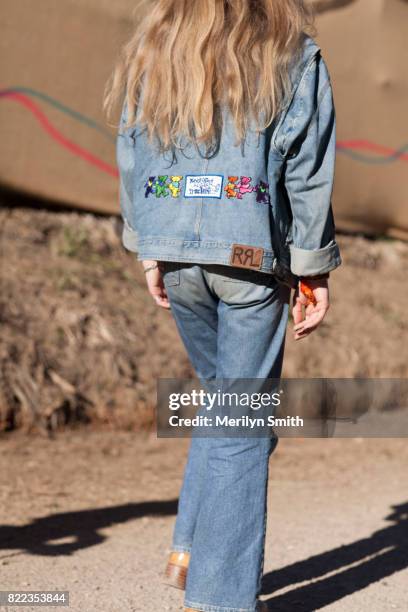 Festivalgoer wearing all denim outfit with embroidered patches during Splendour in the Grass 2017 on July 23, 2017 in Byron Bay, Australia.