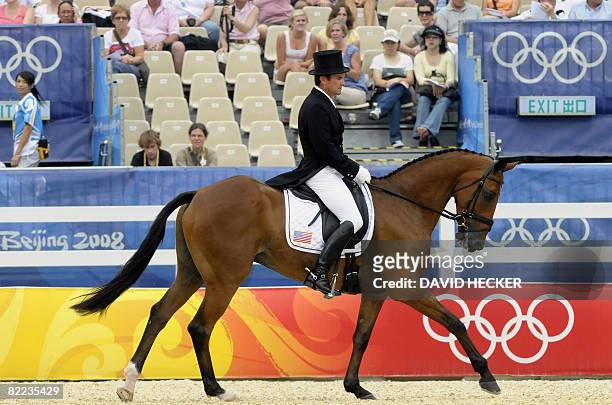 Phillip Dutton of the US rides "Connaught" in the eventing team dressage event in the 2008 Beijing Olympic Games equestrian competition in Hong Kong...