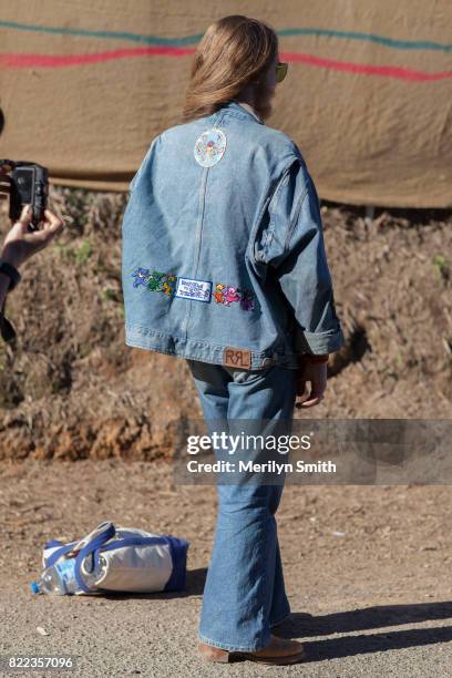 Festivalgoer wearing all denim outfit with embroidered patches during Splendour in the Grass 2017 on July 23, 2017 in Byron Bay, Australia.