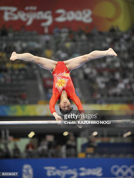 Japan's Miki Uemura competes on the uneven bars during the women's qualification of the artistic gymnastics event of the Beijing 2008 Olympic Games...