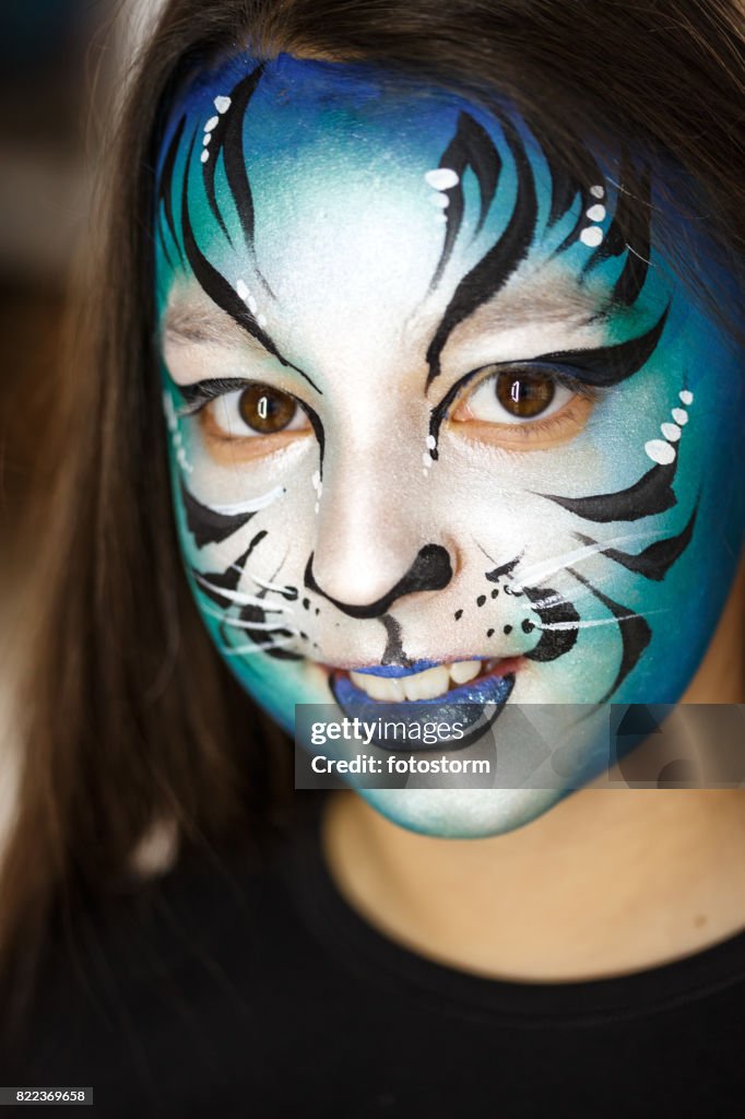 Cute girl with face paint