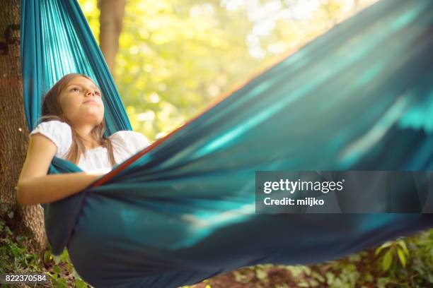 enjoying in nature - smartphones dangling stock pictures, royalty-free photos & images