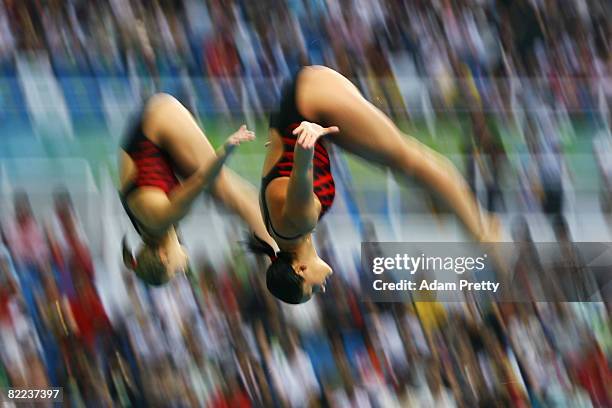 Mariya Voloshchenko of Ukraine and Anna Pysmenska of Ukraine competes in the Women's Synchronized 3m Springboard Final event held at the National...