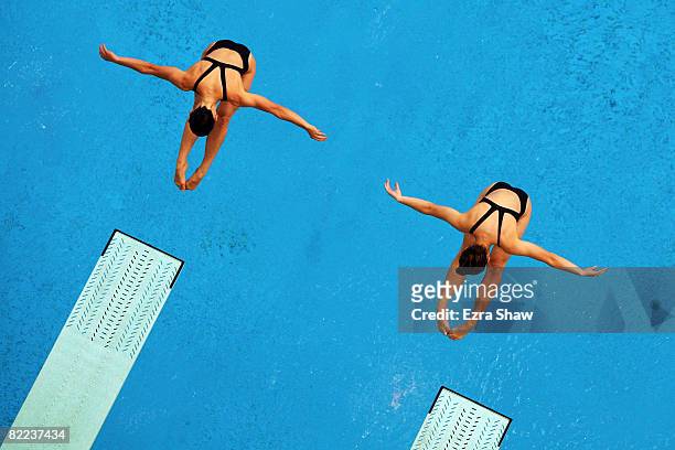 Julia Pakhalina of Russia and Anastasia Pozdnyakova of Russia competes in the Women's Synchronized 3m Springboard Final event held at the National...