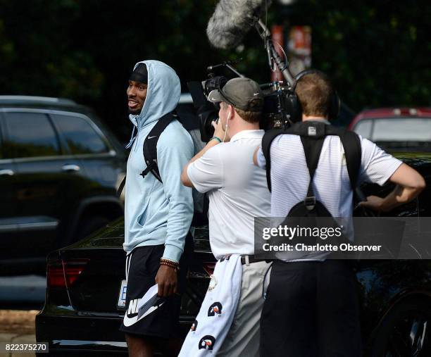 Carolina Panthers cornerback Daryl Worley, left, is the center of attention for a Panthers video team after arriving at the team's dorm on the campus...