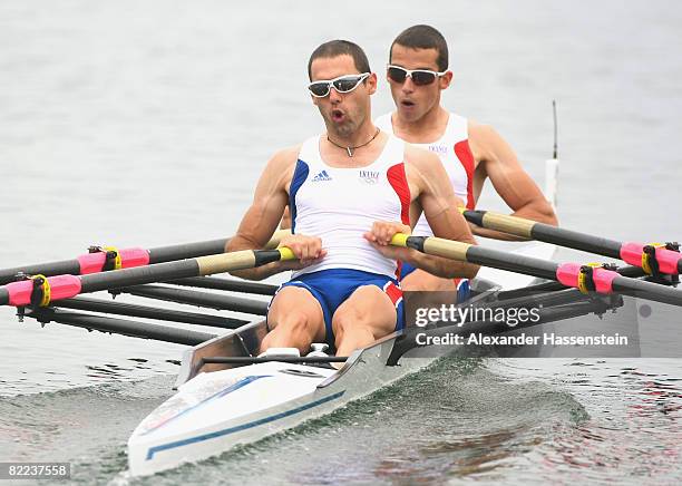 Frederic Dufour and Maxime Goisset of France compete in the Lightweight Men's Double Sculls Heat 4 at the Shunyi Olympic Rowing-Canoeing Park during...