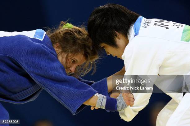 Romy Tarangul of Germany competes against Misato Nakamura of Japan in their -52 kg women's preliminary judo event held during day 2 of the Beijing...