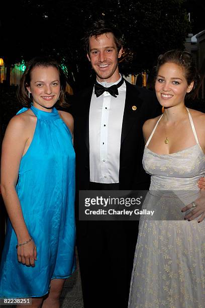 Actress Elisabeth Moss, actor Jason Dohring and actress Erika Christensen pose during the 39th annual Church of Scientology anniversary gala held at...