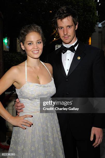 Actors Jason Dohring and Elisabeth Moss pose during the 39th annual Church of Scientology anniversary gala held at The Church of Scientology...