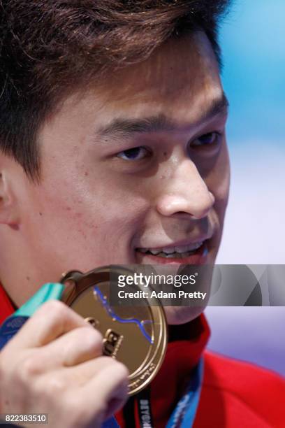 Gold medalist Yang Sun of China poses with the medal won during the Men's 200m Freestyle final on day twelve of the Budapest 2017 FINA World...