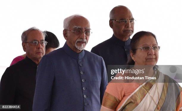 President Pranab Mukherjee, President-elect Ram Nath Kovind, Vice President Hamid Ansari and Lok Sabha Speaker Sumitra Mahajan in a ceremonial...