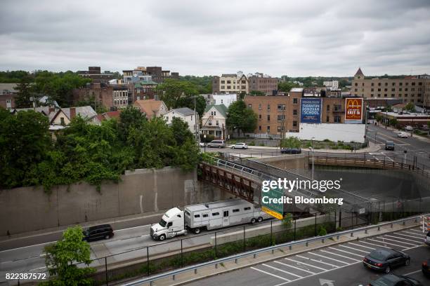 The Millennia development project at 20 Burling Lane, far left, stands across the New England Thruway in New Rochelle, U.S., on Tuesday, May 30,...