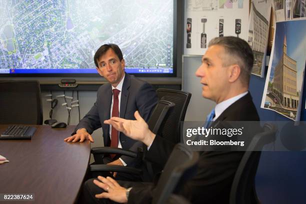 Luiz Aragon, New Rochelle's commissioner of development, right, speaks while Noam Bramson, mayor of New Rochelle, listens during an interview at City...