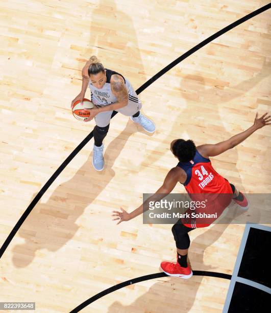Erika de Souza of the San Antonio Stars handles the ball against the Washington Mystics on July 25, 2017 at the AT&T Center in San Antonio, Texas....