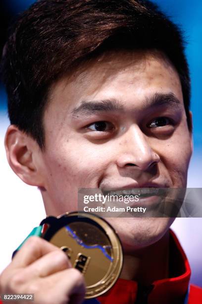 Gold medalist Yang Sun of China poses with the medal won during the Men's 200m Freestyle final on day twelve of the Budapest 2017 FINA World...