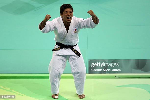 Masato Uchishiba of Japan celebrates after winning the gold medal against Benjamin Darbelet of France in the Men's -66 kg final during day 2 of the...