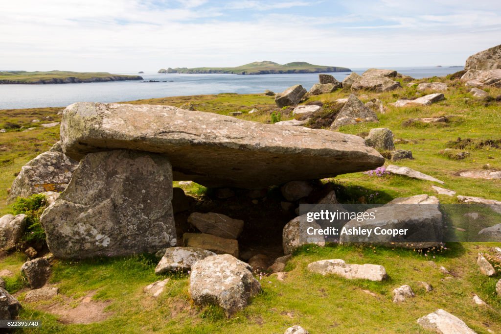 A burial chamber on St Davids Head, Pembrokeshire, Wales, UK, looking towards Ramsey Island.