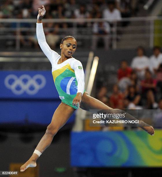 Brazil's Daiane Santos competes on the floor during the women's qualification of the artistic gymnastics event of the Beijing 2008 Olympic Games in...