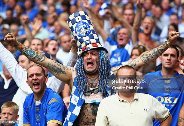 Portsmouth fan welcomes his team prior to the FA Community Shield match between Manchester United and Portsmouth at Wembley Stadium on August 10,...