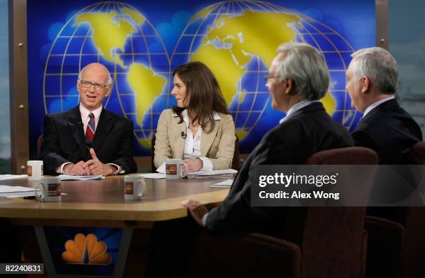 Washington Post columnist David Broder speaks as anchor of CNBC's "Street Signs" Erin Burnett, Washington Post columnist E.J. Dionne, and Wall Street...