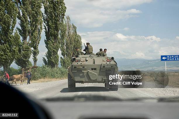 Georgian armoured personnel vehicle heads from Gori towards Tskinvali in South Ossetia, on August 10, near Gori, Georgia. After calling a ceasefire...