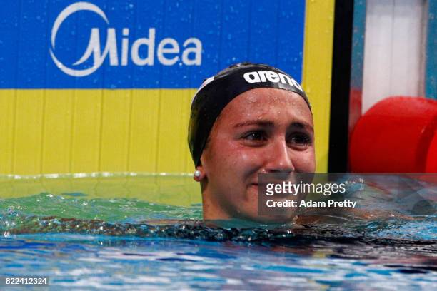 Simona Quadarella of Italy celebrates after winning the bronze medal during the Women's 1500m Freestyle final on day twelve of the Budapest 2017 FINA...