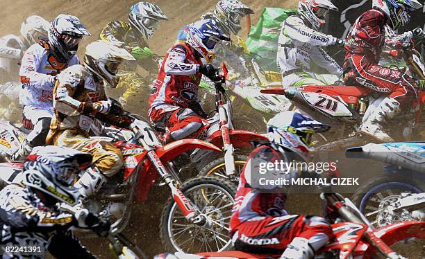 Motocross riders compete during the MX 1 first race of the Grand Prix of the Czech Republic during the motocross world championship on August 10 in...