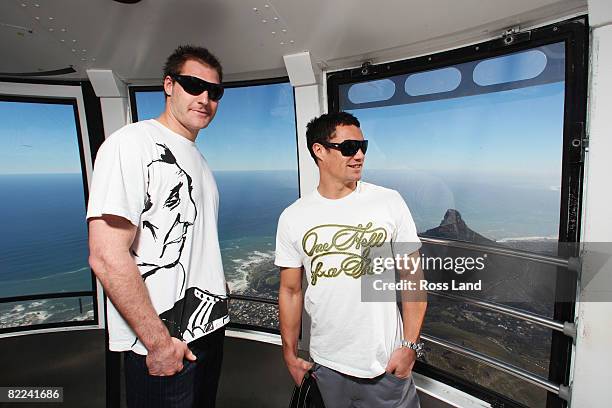Ali Williams and Dan Carter of the New Zealand All Blacks photographed in a cable car during a visit to Table Mountain on August 10, 2008 in Cape...