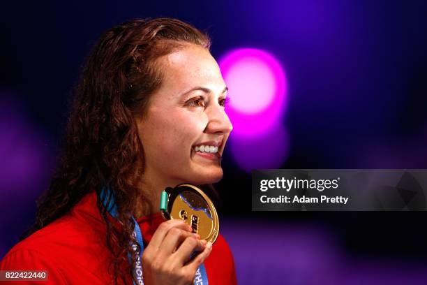 Gold medalist Kylie Jacqueline Masse of Canada poses with the medal won during the Women's 100m Backstroke final on day twelve of the Budapest 2017...