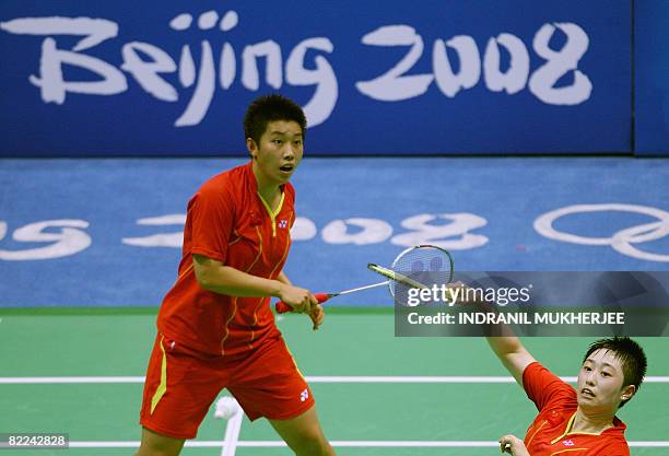 Du Jing and Yu Yang of China play against Ha Jungeun and Kim Minjung of Korea during the women's doubles first round badminton match of the 2008...