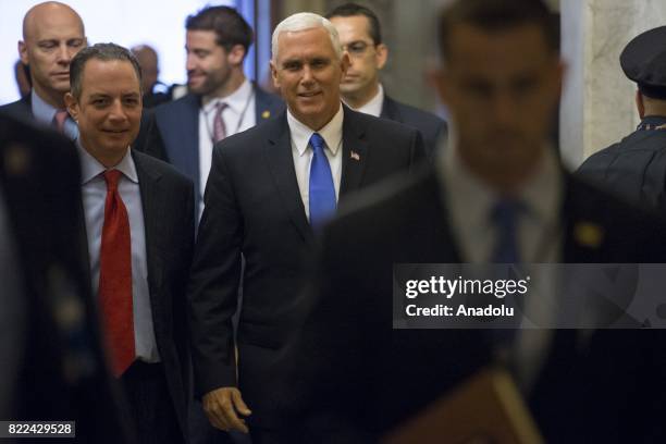 Vice President Mike Pence arrives with White House Chief of Staff Reince Priebus at the U.S. Capitol for congressional policy luncheons and to...