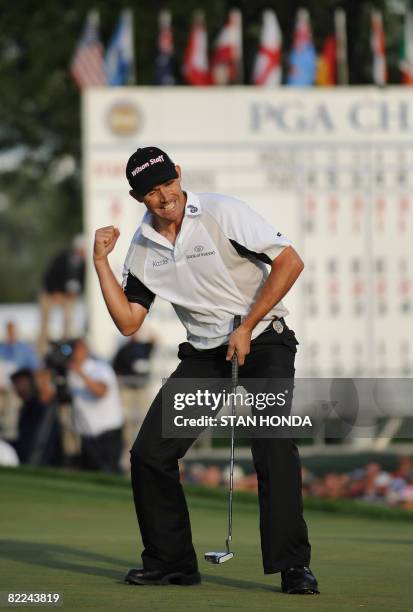 Padraig Harrington of Ireland pumps a fist after sinking a putt to win the 90th PGA Championship on August 10, 2008 at Oakland Hills Country Club in...