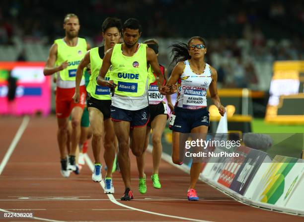 Maritza Arango Buitrago of Columbia and Guide Jonathan Daybes Sanchez Gonzalez compete Women's 1500m T11 Final during World Para Athletics...