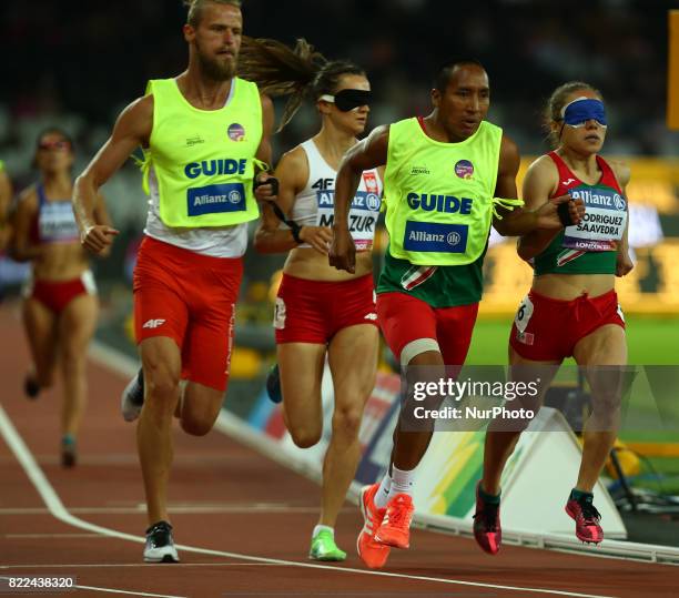 Mo Rodriguez Saavedra of Mexico and GuideFelipe Modesto Eustasio compete Women's 1500m T11 Final during World Para Athletics Championships Day Three...